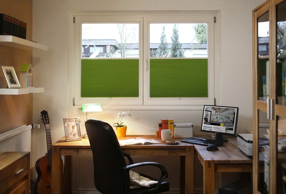 Green blackout blinds in home office