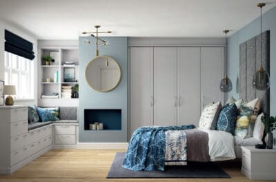 fitted wardrobes with matching window seating and drawers