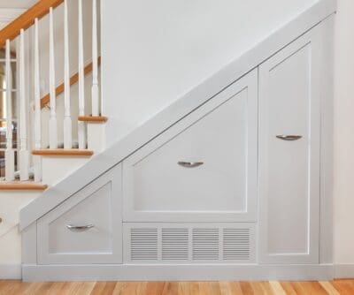 Understairs fitted storage with a vent