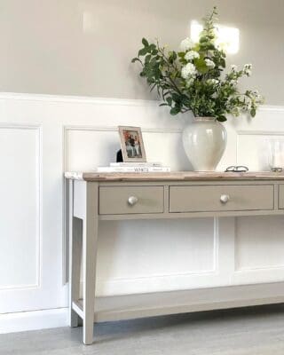 White wall panelling in a hallway