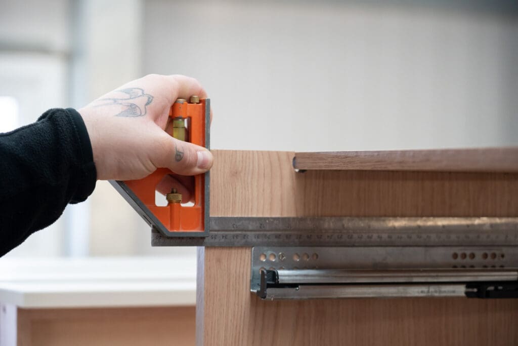 Fitted furniture being constructed and measured