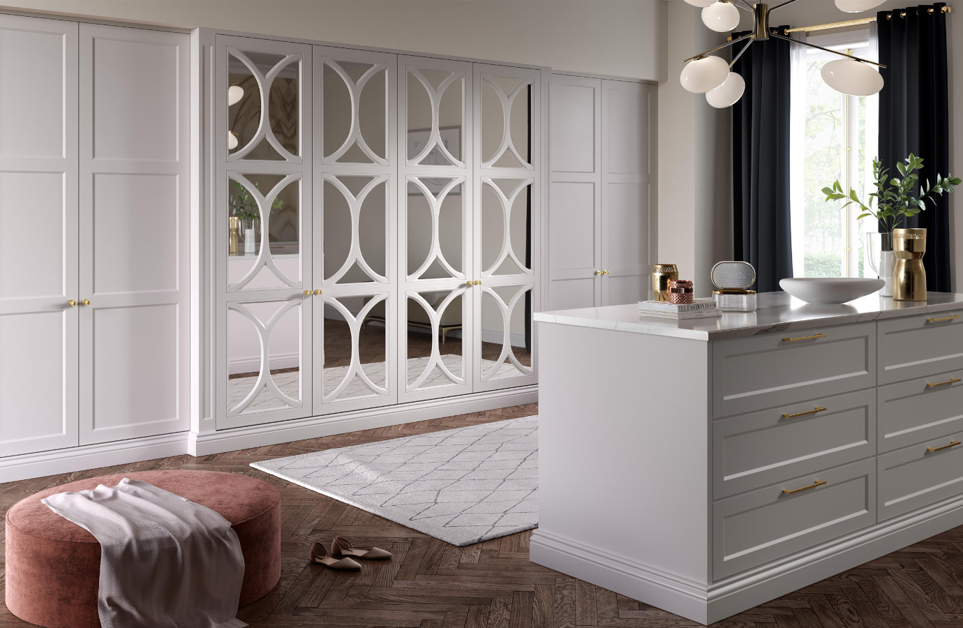 White fitted wardrobes in a dressing room with geometric mirrored panels
